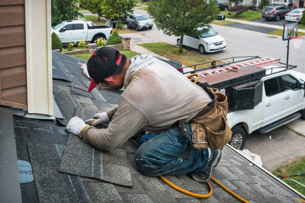 Professional Roof Replacement technician working in North Freedom, WI